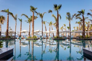 Indoor pool, 2 outdoor pools, pool umbrellas, sun loungers