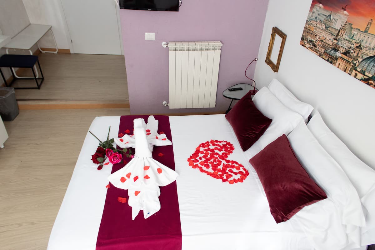 Premium bedding, down duvets, in-room safe, desk