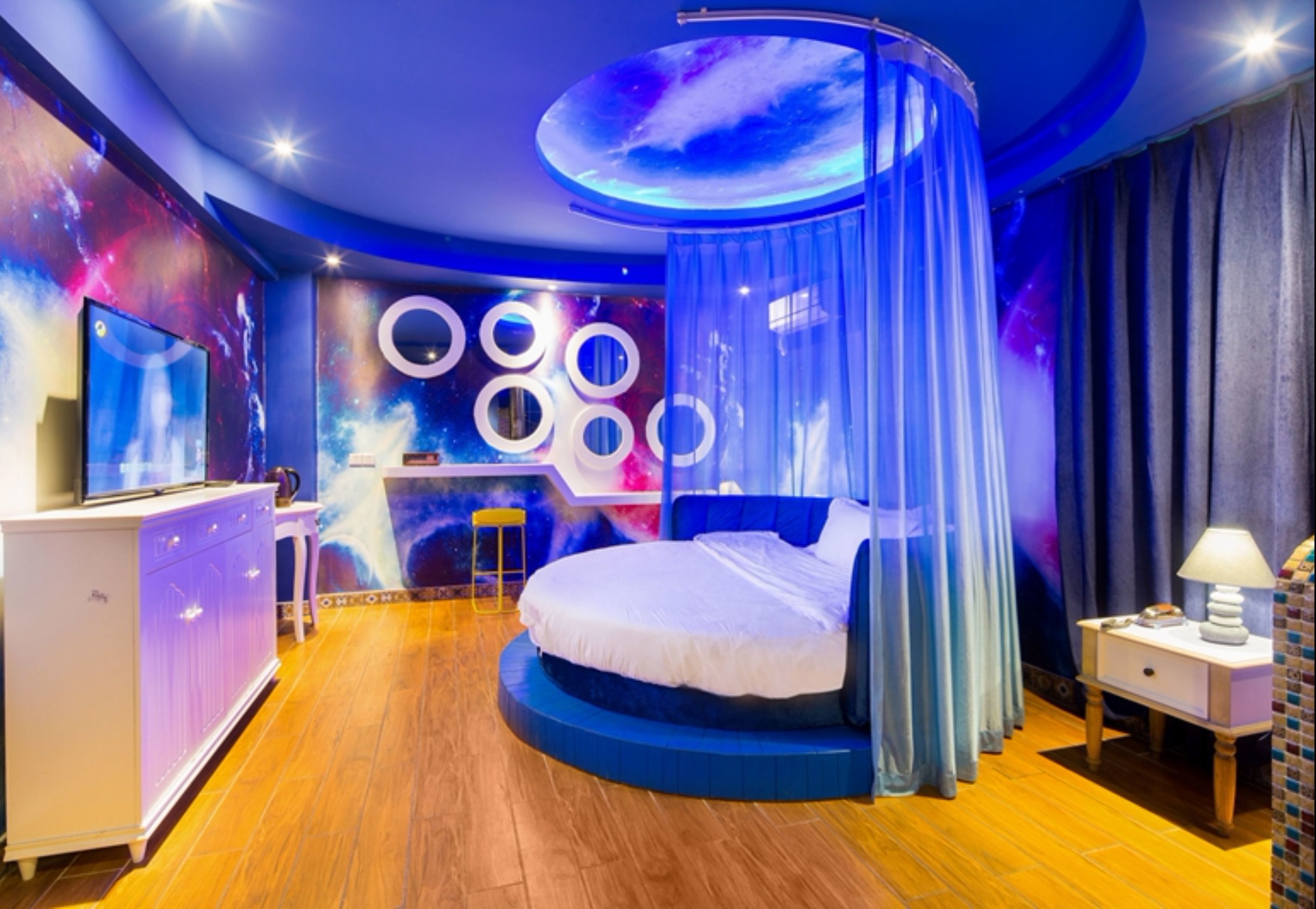 romantic room with round bed | desk, blackout curtains, free wifi