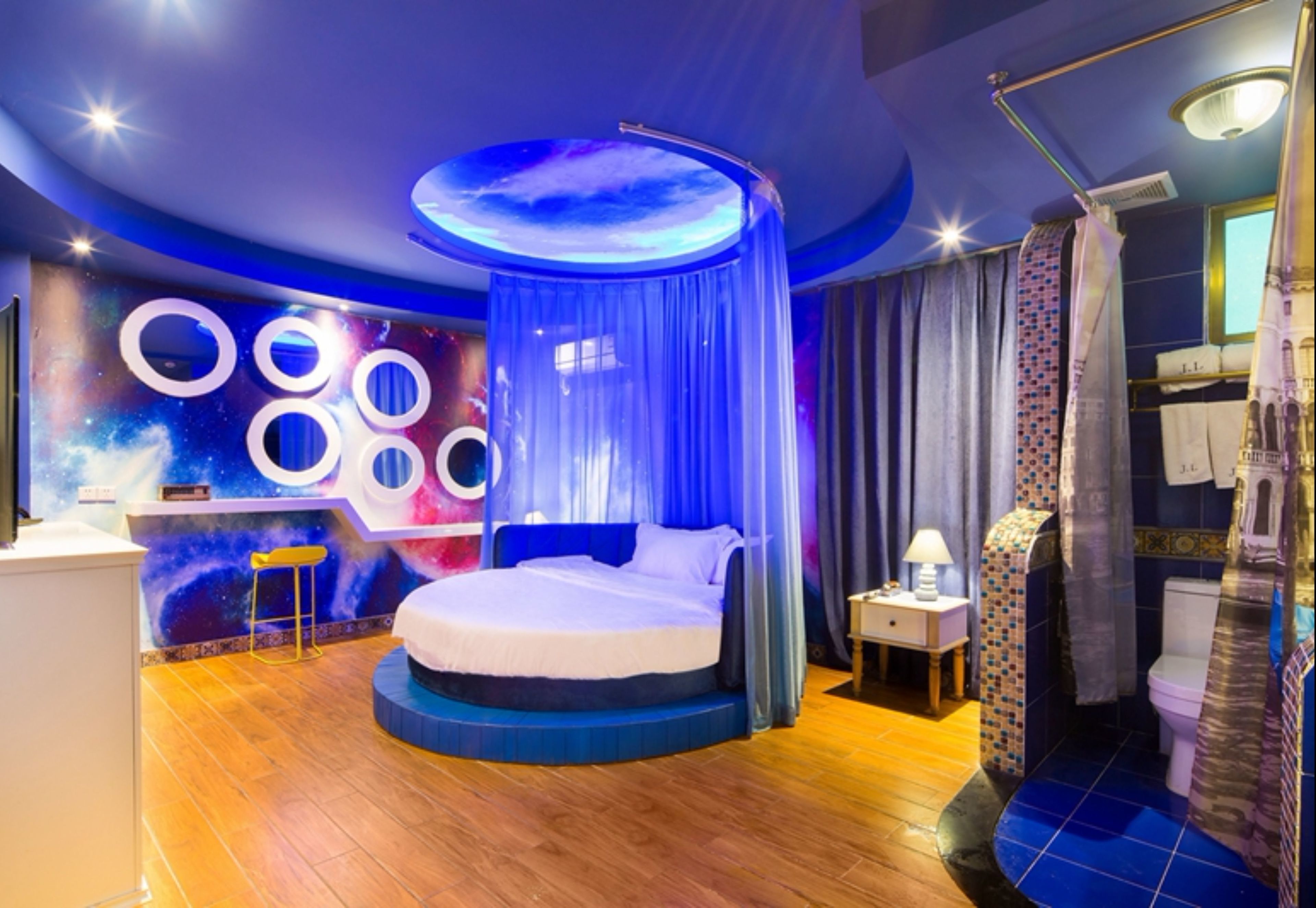 romantic room with round bed | desk, blackout curtains, free wifi