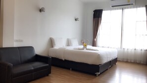 Deluxe A Twin bed | Décor unique, bureau, accès au Wi-Fi (inclus), literie fournie