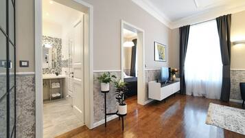 Rococo Apartment | Living area | 80-cm flat-screen TV with cable channels, TV, Netflix