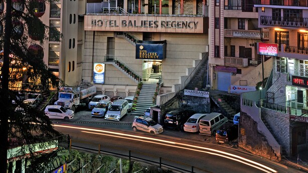 A multi-story hotel with a prominent entrance and a sign reading "Hotel Baljees Regency". - Hotel Baljees Regency (Shimla)