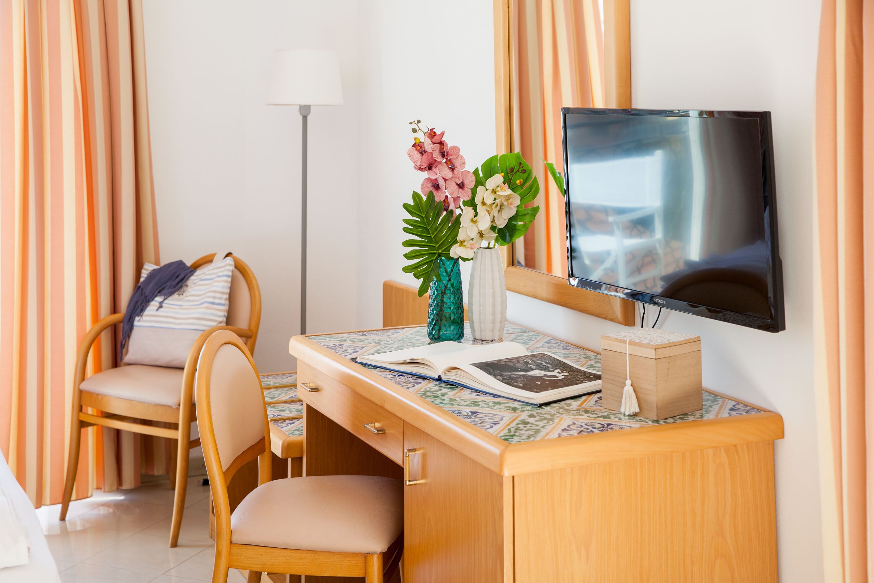 family room | 1 bedroom, minibar, in-room safe, desk