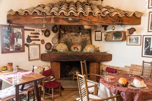 Breakfast, lunch, dinner served; local cuisine, pool views 