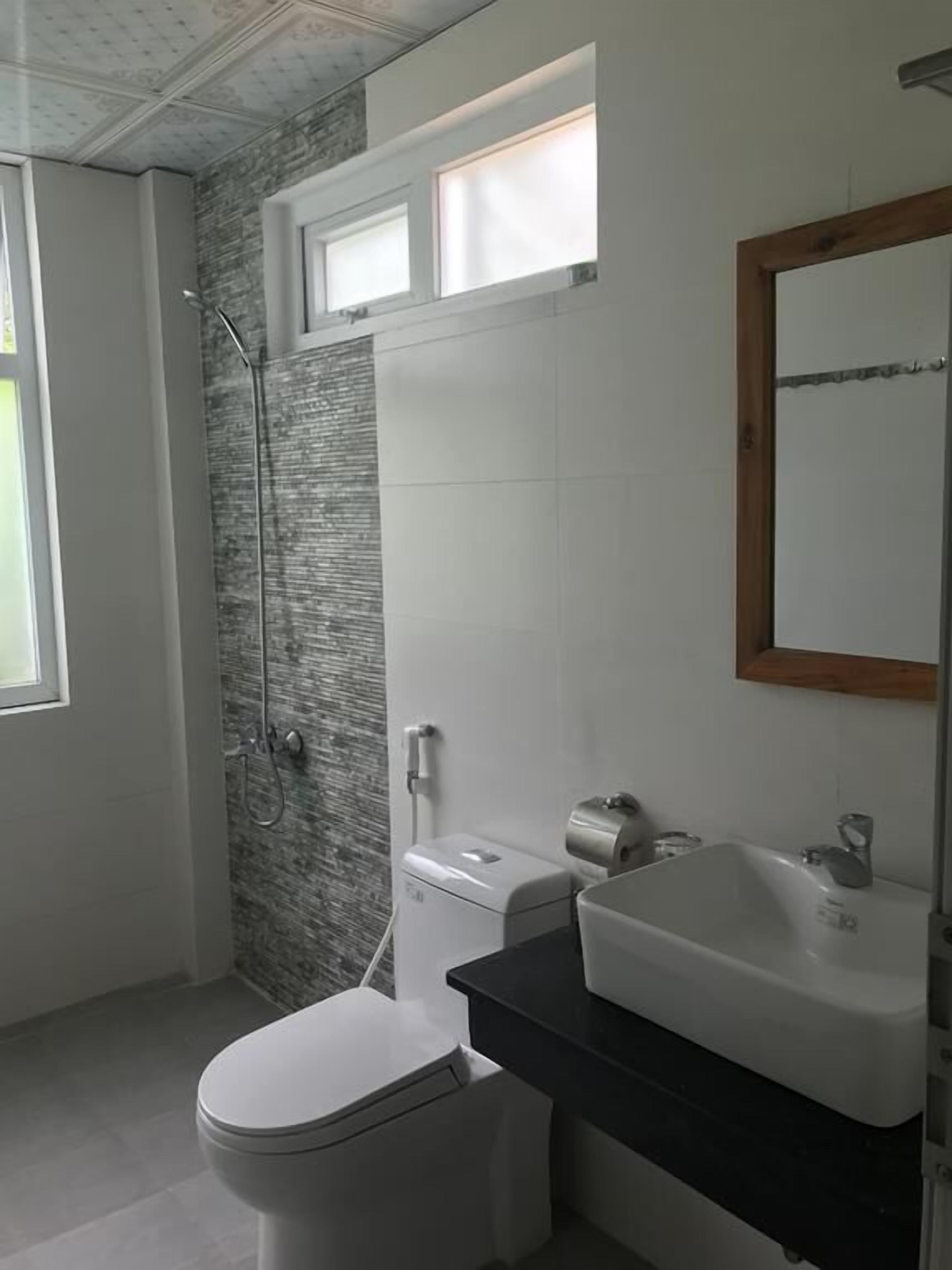 standard quadruple room, kitchen, pool view | bathroom | shower, designer toiletries, hair dryer, slippers