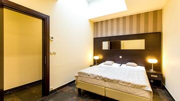 Apartment, 1 Bedroom, Balcony | 1 bedroom, in-room safe, blackout curtains, soundproofing