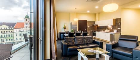 Apartment, 2 Bedrooms, Balcony | Living area | Flat-screen TV
