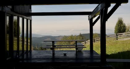 Casa del arquitecto Karersee, vista del jardín de rosas, Latemar y Alpes occidentales