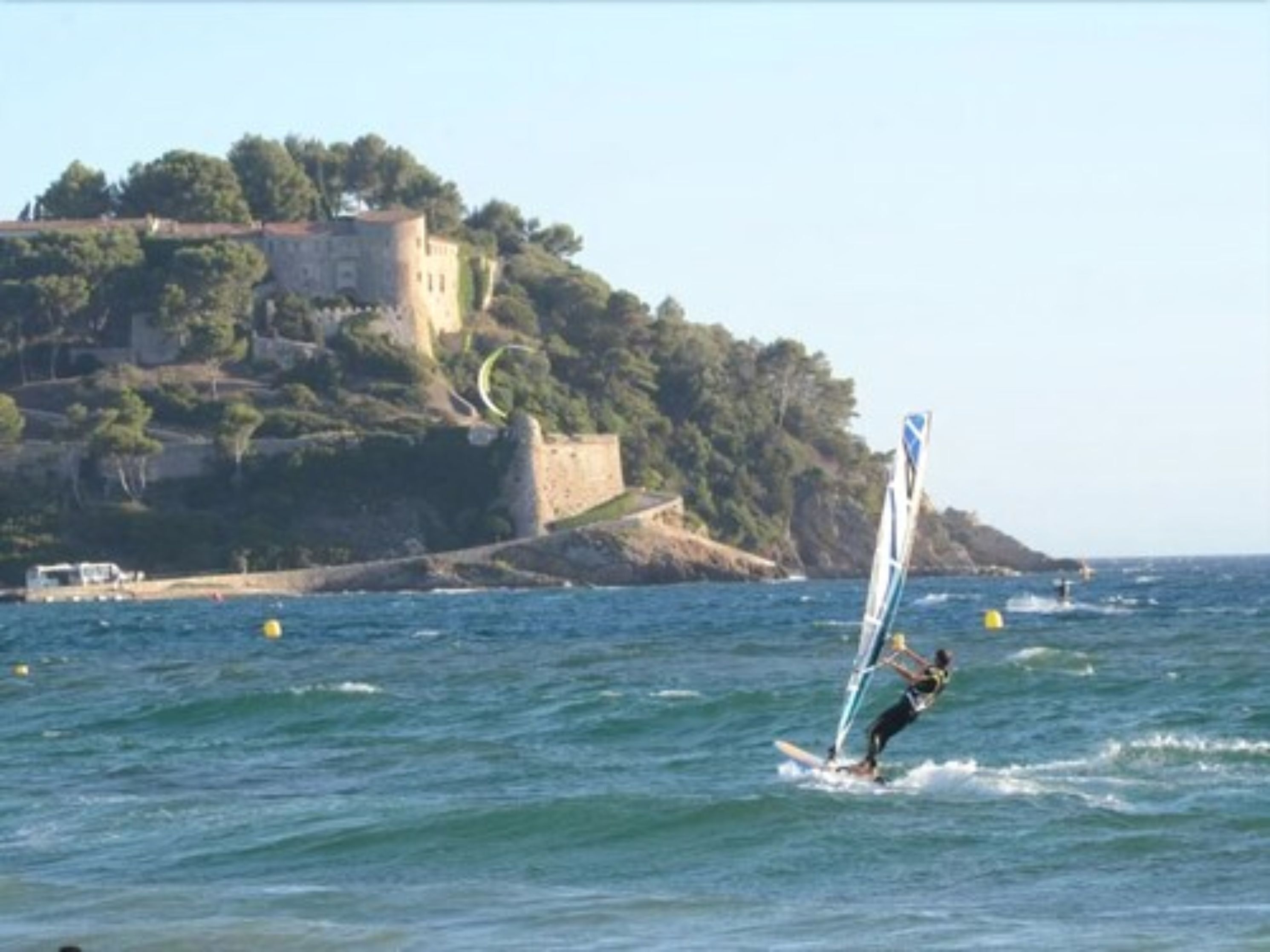 beach nearby, windsurfing