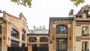 A historic building with arched windows and a brick facade. - Sweett | Brune VI - Three Bedroom Apartment, Sleeps 8 (Paris)