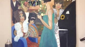 A painting of a formal event with people in elegant attire.