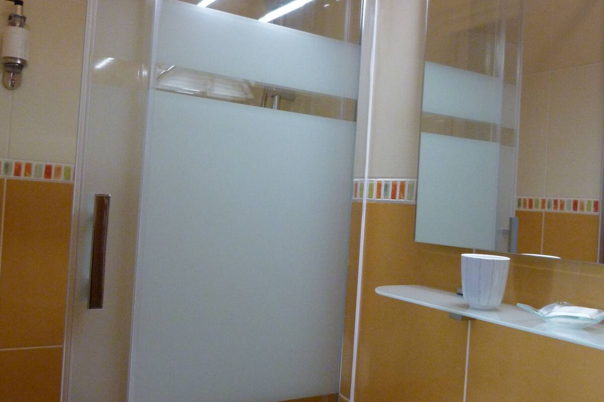 superior double room | bathroom | shower, free toiletries, hair dryer, towels