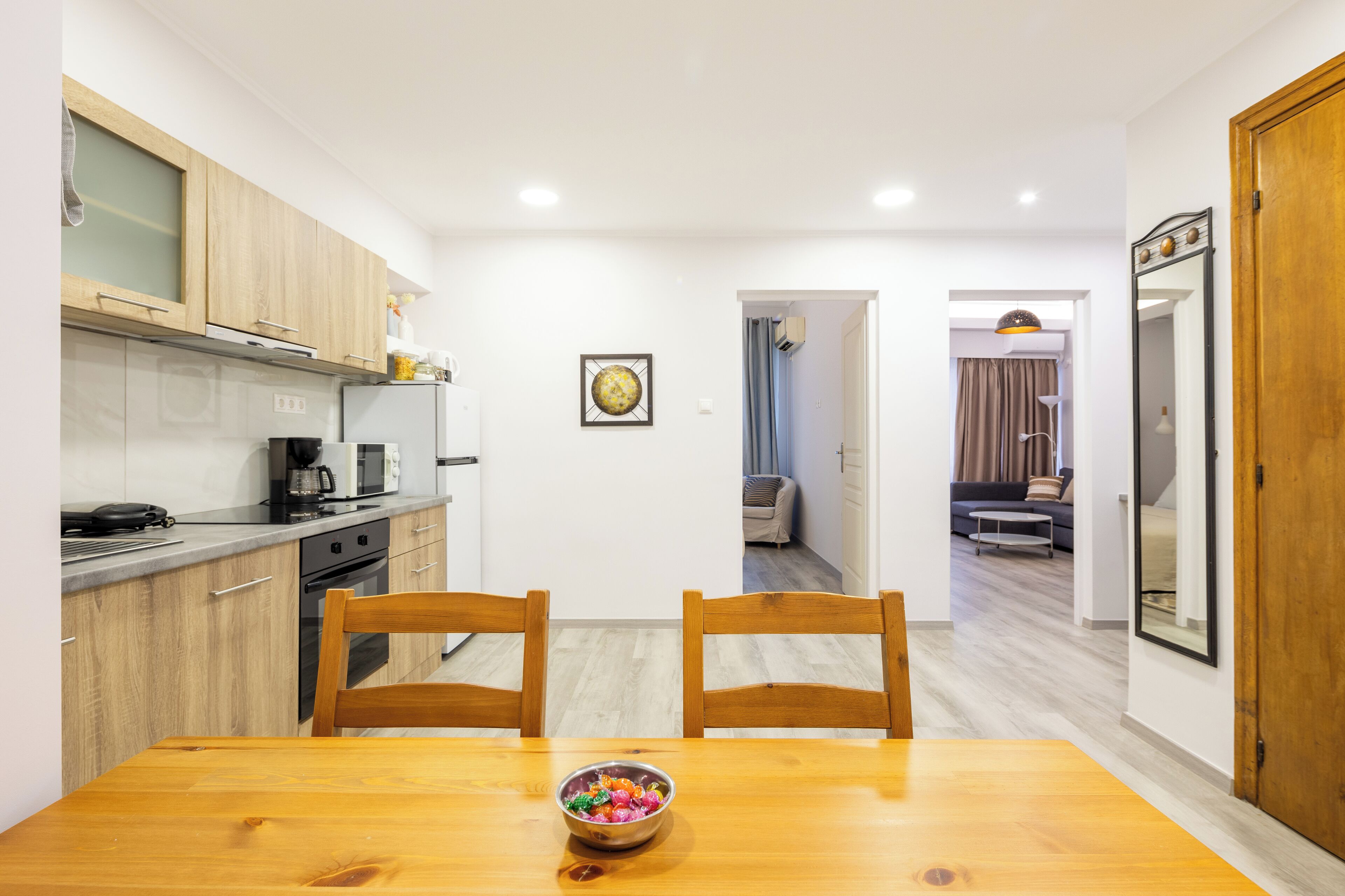 Apartment, 1 Bedroom, City View | Desk, soundproofing, iron/ironing board, free cots/infant beds