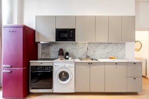 Fridge, microwave, stovetop, coffee/tea maker