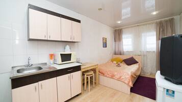 Kamar Double Ekonomi, kamar mandi umum | Setrika/meja setrika, Wi-Fi gratis, dan seprai linen