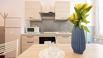 Appartamento, 2 camere da letto (Orione) | Cucina privata | Frigorifero nell'area comune, forno a microonde nell'area comune