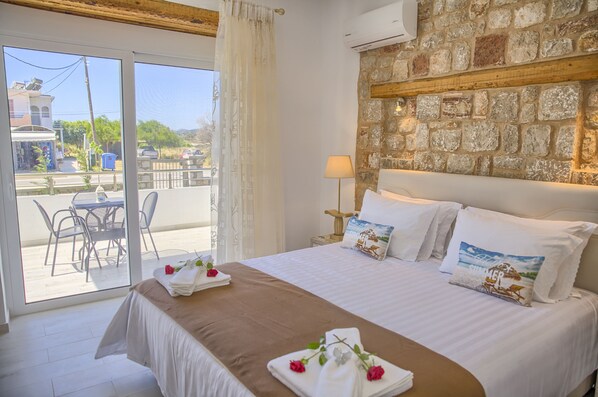 Apartment, 1 Bedroom, Ground Floor | 1 bedroom, Egyptian cotton sheets, hypo-allergenic bedding - Haraki Stone Apartments (Rhodes)