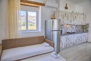 Apartment, 1 Bedroom, Ground Floor | Living room | Flat-screen TV - Haraki Stone Apartments (Rhodes)