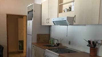Apartment, 1 Bedroom, Non Smoking | Shared kitchen | Fridge, microwave