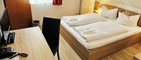 Habitación familiar | Ropa de cama hipoalergénica, wifi gratis y ropa de cama