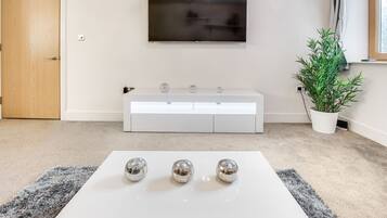 Apartment, 2 Bedrooms, Ensuite (The President ) | Living area | 55-inch flat-screen TV with digital channels, TV