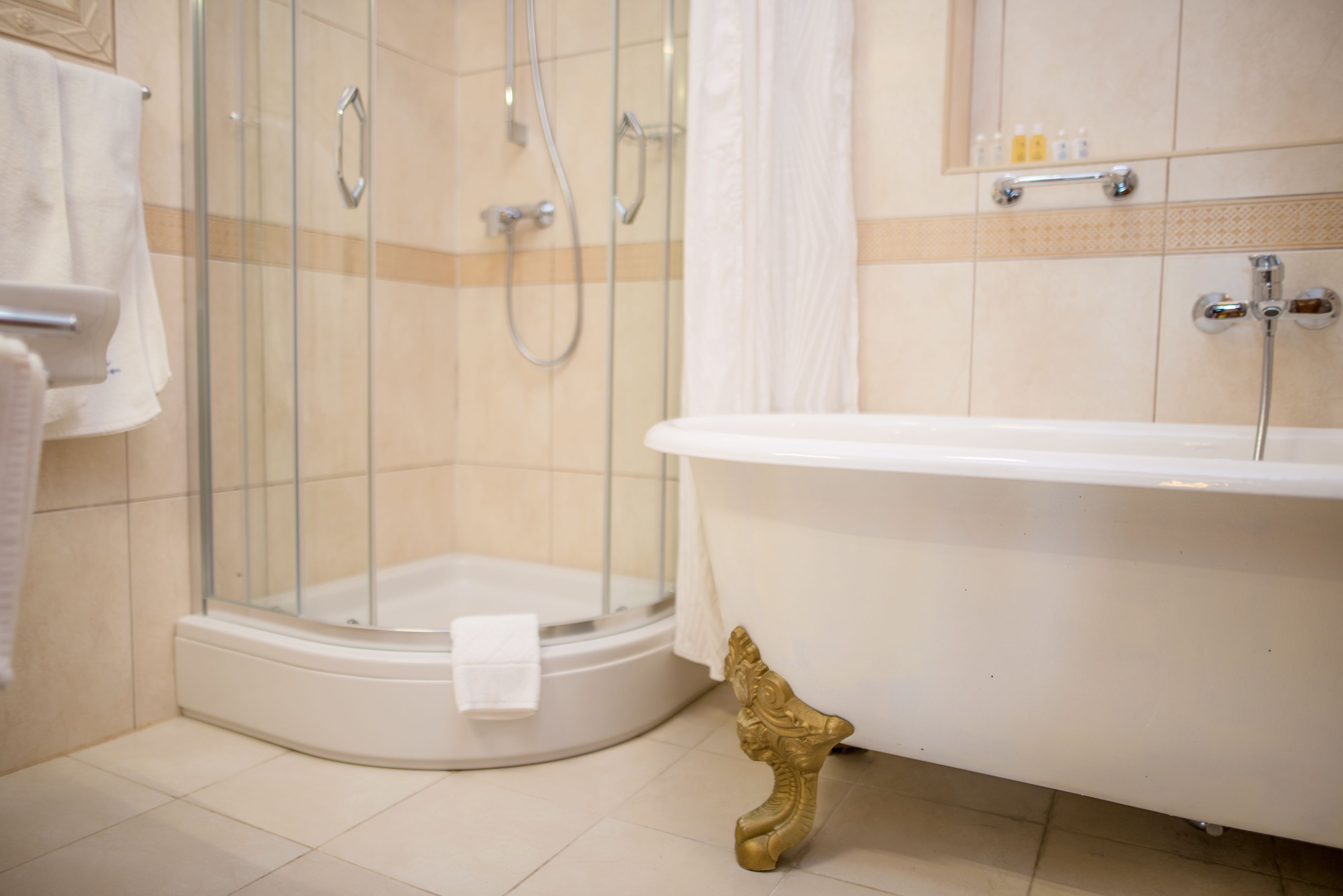 superior suite, bay view, sea facing | bathroom | shower, free toiletries, hair dryer, bathrobes