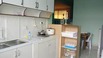 Microwave, stovetop, high chair, cookware/dishes/utensils