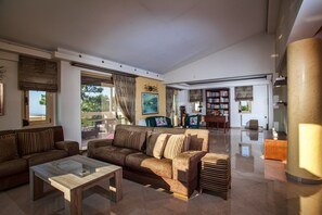 Deluxe Villa, 4 Bedrooms, Private Pool, Sea View | Living area | Flat-screen TV, fireplace, table tennis - Palladio Luxury Villa (Rethymno)