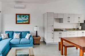 Comfort Apartment, 2 Bedrooms | Living room | Flat-screen TV
