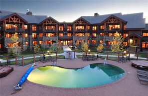 Outdoor pool, a natural pool - 6117 Bear Lodge, Trappeur's Crossing Apartment 1 (Steamboat Springs)