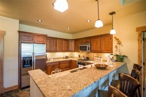 Condo, Multiple Beds (6308 Bear Lodge, Trappeur's Crossing) | Private kitchen | Fridge, microwave, oven, stovetop - 6308 Bear Lodge, Trappeur's Crossing Apartment 3 (Steamboat Springs)