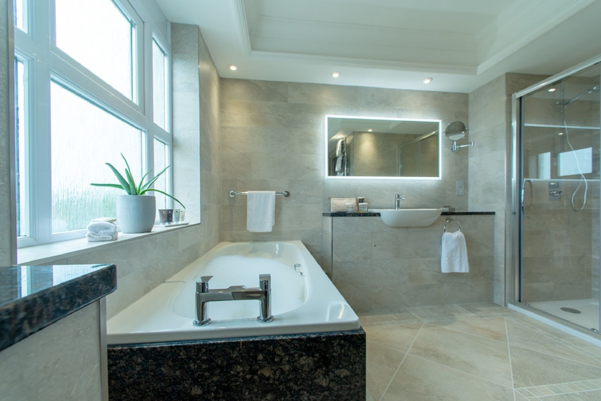 deep-soaking bathtub, free toiletries, hair dryer, bathrobes