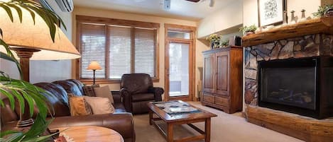 Apartment | Living area | TV, fireplace