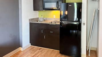 Full-sized fridge, microwave, coffee/tea maker, dining tables