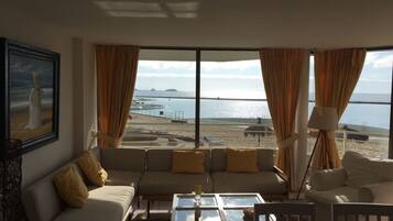 Apartment, 3 Bedrooms | Living area | Flat-screen TV