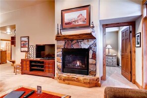 Condo, Multiple Beds (2309 Timberline Lodge, Trappeur's Cro) | Living area | TV, fireplace - 2309 Timberline Lodge, Trappeur's Crossing Apartment 1 (Steamboat Springs)
