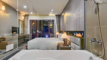Luxury Villa, Partial Ocean View | Bathroom | Deep-soaking bathtub, rainfall showerhead, free toiletries, hair dryer