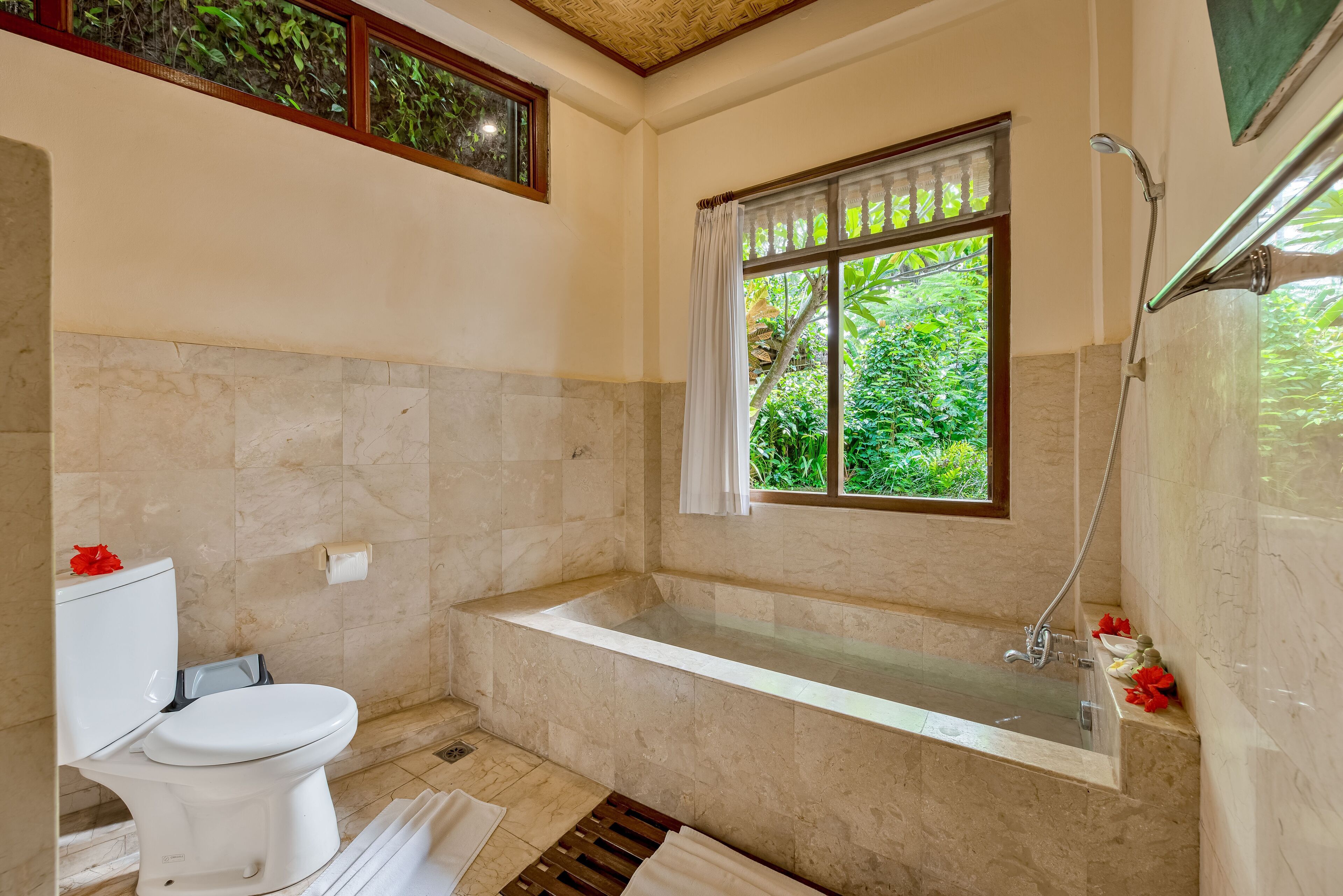 superior pool view sandat | bathroom | combined shower/bathtub, rainfall showerhead, free toiletries