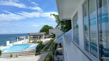 Outdoor pool, open 7:00 AM to 10:00 PM, sun loungers