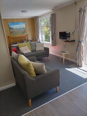 Medium Family Cabin | Living area | Flat-screen TV, DVD player - Arthur's Pass Alpine Motel (Arthur's Pass National Park)