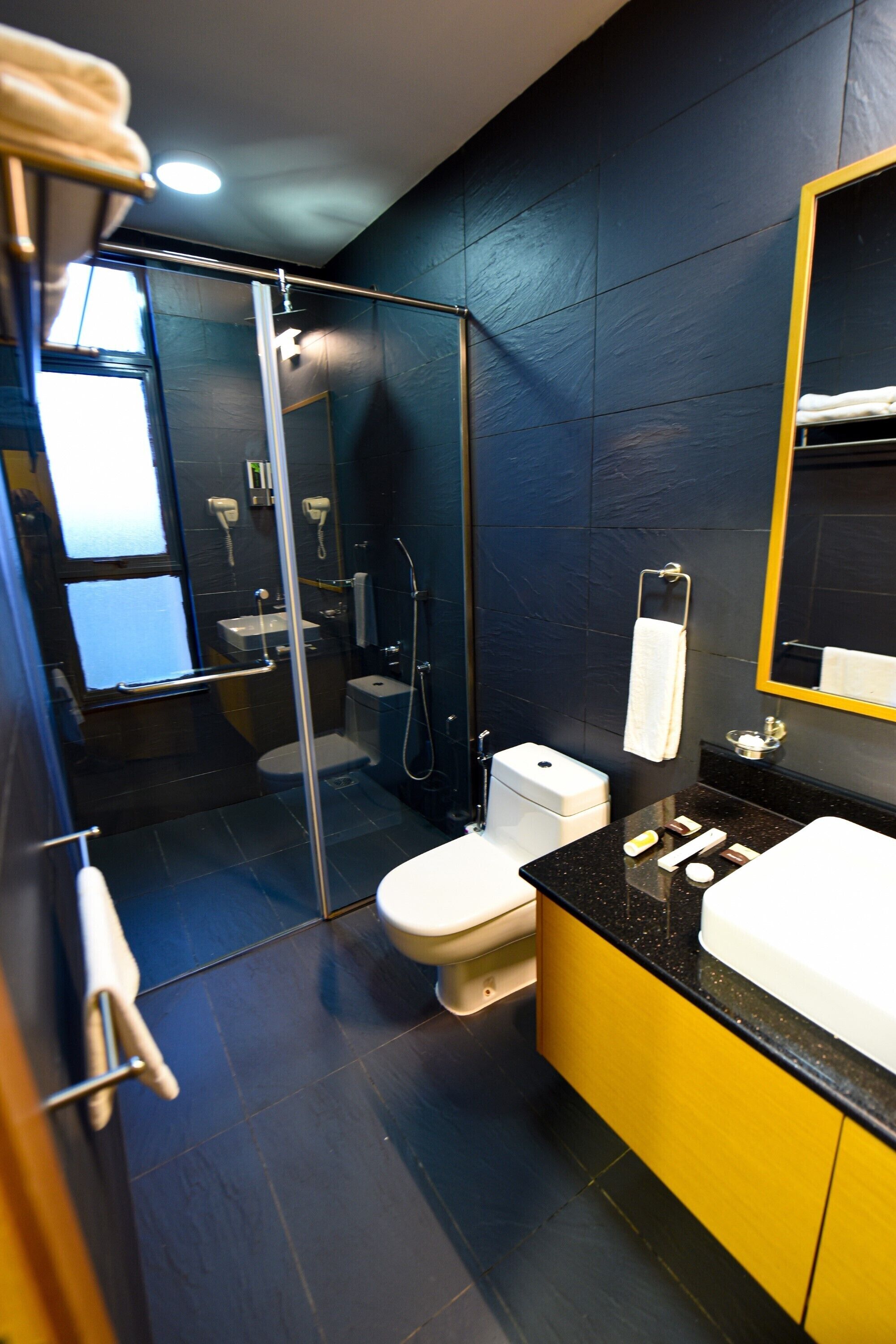 rainfall showerhead, free toiletries, hair dryer, slippers