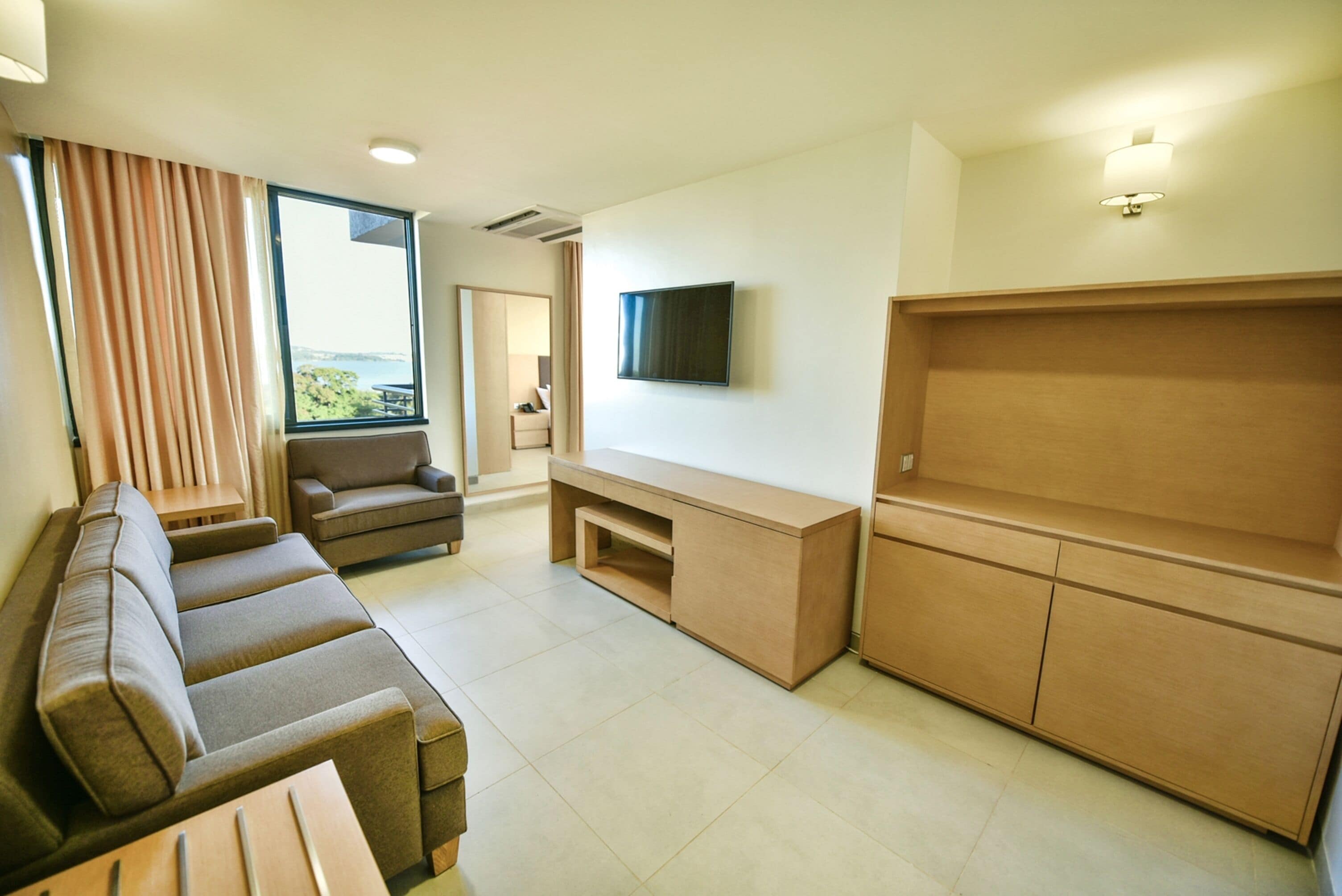 classic suite, balcony, lake view | premium bedding, minibar, in-room safe, desk