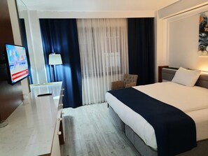 Standard Double Room, 1 Double Bed | Minibar, in-room safe, desk, laptop workspace