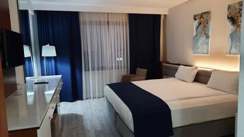 Standard Double Room, 1 Double Bed | Minibar, in-room safe, desk, laptop workspace