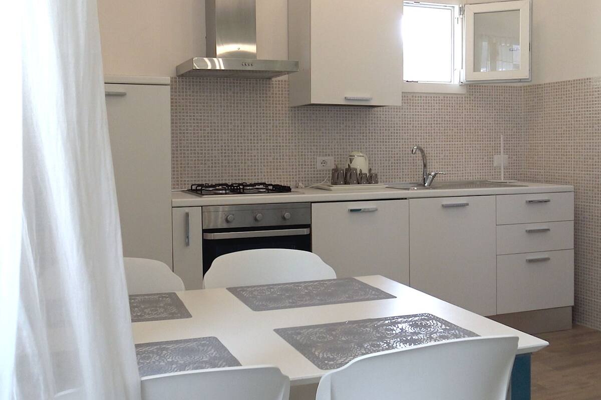 apartment, annex building | living area | tv