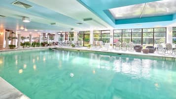 Indoor pool, outdoor pool, pool umbrellas, sun loungers