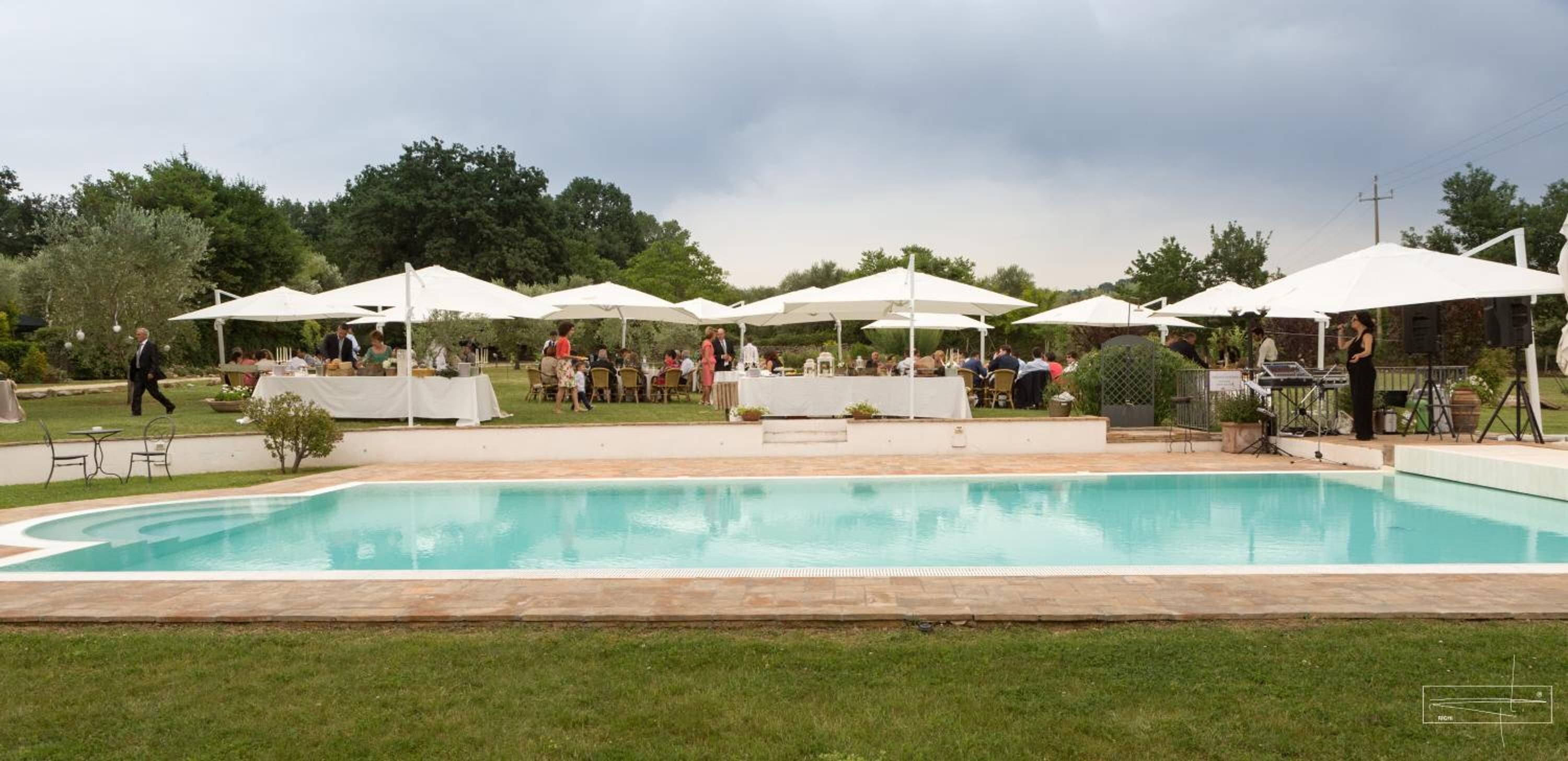 Seasonal outdoor pool, pool umbrellas, pool loungers