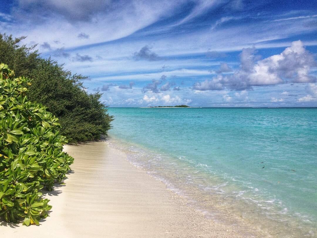 Beach nearby, white sand, sun loungers, beach umbrellas