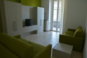 Apartament, 1 dormitori | Sala d'estar | Televisor de pantalla plana